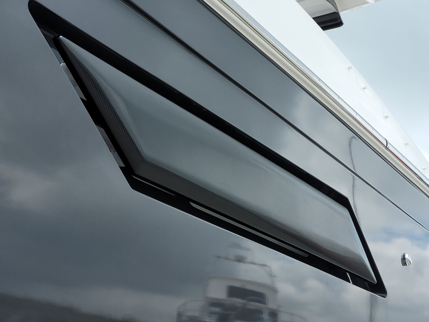 Azimut v50 side vent wrapped in 'carbon-effect' vinyl at Hamble Point Marina